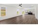 Living room with contemporary floors, an open floor plan and a view of the kitchen at 50 Rosewood Ln, Youngsville, NC 27596