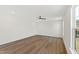 Well-lit living room with modern floors, recessed lights and a ceiling fan at 50 Rosewood Ln, Youngsville, NC 27596
