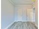 Bedroom with neutral paint and wood flooring, offers versatile space for relaxation and personalization at 500 Cokey Rd, Rocky Mount, NC 27801
