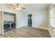 Spacious room with gray flooring, modern washer and dryer, and natural light at 500 Cokey Rd, Rocky Mount, NC 27801