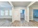 Bright living room with hardwood floors and neutral paint, offering versatile space for relaxation and gathering at 500 Cokey Rd, Rocky Mount, NC 27801