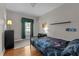Contemporary bedroom with sleek furniture, wood floors, and a modern aesthetic at 5013 W Pool Rd, Rougemont, NC 27572