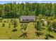 Charming single-story home with a well-kept lawn and mature trees at 5013 W Pool Rd, Rougemont, NC 27572