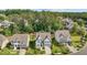 Aerial view of the neighborhood showcasing the homes and tree lined streets at 5145 Landguard Dr, Raleigh, NC 27613