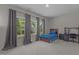 Bedroom featuring large windows, curtains, and a desk at 5145 Landguard Dr, Raleigh, NC 27613
