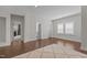 Bedroom featuring hard wood floors, a textured rug and lots of natural light at 5145 Landguard Dr, Raleigh, NC 27613