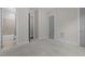 Spacious bedroom with ensuite bathroom and ample natural light at 5145 Landguard Dr, Raleigh, NC 27613