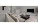 Comfortable bonus room furnished with a plush sofa and a stylish coffee table on top of a decorative rug at 5145 Landguard Dr, Raleigh, NC 27613