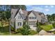 Charming two-story home featuring a two-car garage, manicured lawn, and beautiful architectural details at 5145 Landguard Dr, Raleigh, NC 27613