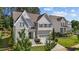 Beautifully landscaped two-story home with a two-car garage and classic architectural design at 5145 Landguard Dr, Raleigh, NC 27613