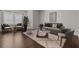 Well decorated living room with neutral furniture, an area rug and lots of light at 5145 Landguard Dr, Raleigh, NC 27613