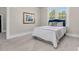 Serene bedroom featuring soft carpeting and a comfortable bed with plush pillows and white bedding at 5299 Momeyer Way, Nashville, NC 27856