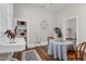 Charming breakfast nook with vintage sink, built-in shelves and a round table perfect for cozy meals at 5299 Momeyer Way, Nashville, NC 27856