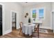 Bright dining area with table, chairs, and a unique sink and window at 5299 Momeyer Way, Nashville, NC 27856