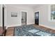 Spacious living room with hardwood floors, a decorative rug, and bright natural light at 5299 Momeyer Way, Nashville, NC 27856