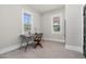 Bright office space with a desk, chair, and ample natural light streaming through two large windows at 5299 Momeyer Way, Nashville, NC 27856
