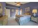 Charming bedroom with vaulted ceiling, natural light, and an ensuite bathroom at 5417 Harrington Grove Dr, Raleigh, NC 27613