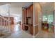 Inviting entryway with traditional wood cabinets and views into the adjacent living and dining rooms at 5417 Harrington Grove Dr, Raleigh, NC 27613