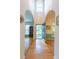 Elegant foyer with hardwood floors leading to the open living and dining spaces at 5417 Harrington Grove Dr, Raleigh, NC 27613