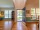 Inviting foyer with hardwood floors and an open view to the living and dining spaces at 5417 Harrington Grove Dr, Raleigh, NC 27613
