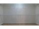 Empty walk-in closet features hanging rods and carpet flooring at 5417 Harrington Grove Dr, Raleigh, NC 27613
