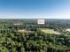 Scenic aerial shot of Buffaloe Road Athletic Park nestled amidst a beautiful, green, wooded area at 5812 N Beaver Ln, Raleigh, NC 27604