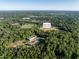 An aerial shot showcasing the Buffalo Road Aquatic Center amidst a lush, green landscape at 5812 N Beaver Ln, Raleigh, NC 27604