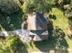 Aerial view of a home with a large driveway and well-maintained landscaping at 5812 N Beaver Ln, Raleigh, NC 27604