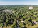 Aerial view of a neighborhood near Downtown Raleigh, surrounded by lush greenery at 5812 N Beaver Ln, Raleigh, NC 27604