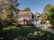 Attractive two-story home featuring a well-kept front lawn and a two-car garage at 5812 N Beaver Ln, Raleigh, NC 27604
