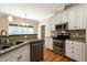 Well-equipped kitchen with stainless steel appliances and granite countertops at 5812 N Beaver Ln, Raleigh, NC 27604