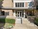Apartment building entrance with glass doors, visible unit number, and landscaping at 618 N Boylan Ave # 810, Raleigh, NC 27603