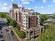 Beautiful multi-story building with brick accents, balconies, and well-maintained landscaping at 618 N Boylan Ave # 810, Raleigh, NC 27603