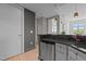 Kitchen displays stainless steel appliances, granite countertops, hardwood floors, and white and grey walls at 618 N Boylan Ave # 810, Raleigh, NC 27603