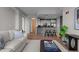 Bright living area with kitchen, hardwood floors and a comfortable seating area at 618 N Boylan Ave # 810, Raleigh, NC 27603