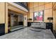 Elegant lobby with seating areas, a statement painting, and elevator access at 618 N Boylan Ave # 810, Raleigh, NC 27603