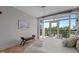 Primary bedroom boasts balcony access, hardwood floors, lots of natural light and city views at 618 N Boylan Ave # 810, Raleigh, NC 27603