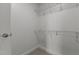 Well-organized walk-in closet featuring shelving units and plenty of room for clothing at 618 N Boylan Ave # 810, Raleigh, NC 27603