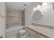 Beautiful bathroom featuring tile shower, soaking tub, and granite countertop at 6420 Dresden Ln, Raleigh, NC 27612