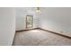 Bedroom featuring neutral colors, carpet, and a window with natural light at 6420 Dresden Ln, Raleigh, NC 27612