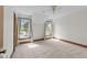 Bright bedroom featuring carpet, ceiling fan, and natural light from windows at 6420 Dresden Ln, Raleigh, NC 27612