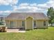 The backyard features a patio area and green lawn, perfect for outdoor enjoyment and activities at 649 Flaherty Ave, Wake Forest, NC 27587