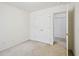Spacious bedroom featuring a double-door closet and neutral carpeting at 649 Flaherty Ave, Wake Forest, NC 27587