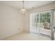Bright dining area with sliding glass doors and tiled flooring at 649 Flaherty Ave, Wake Forest, NC 27587