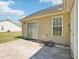 A concrete patio and sliding glass door offer outdoor relaxation and easy access to the home's interior at 649 Flaherty Ave, Wake Forest, NC 27587