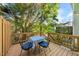 Cozy outdoor deck with a small table, perfect for relaxing and enjoying the surrounding nature at 6612 Rossford Ln, Durham, NC 27713