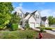 Charming two-story house boasts manicured lawn and inviting curb appeal at 6612 Rossford Ln, Durham, NC 27713