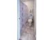 Cozy bathroom features a toilet, shower with curtain, and tiled floor at 7177 Sandy Creek Dr, Raleigh, NC 27615