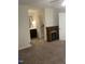 Bedroom with a fireplace and an adjoining bathroom at 7177 Sandy Creek Dr, Raleigh, NC 27615
