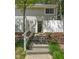 Inviting two-story home featuring well-maintained front yard and a charming walkway to the front door at 7177 Sandy Creek Dr, Raleigh, NC 27615